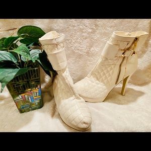 White quilted ankle boot heel